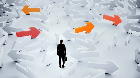Businessman choosing his business direction
